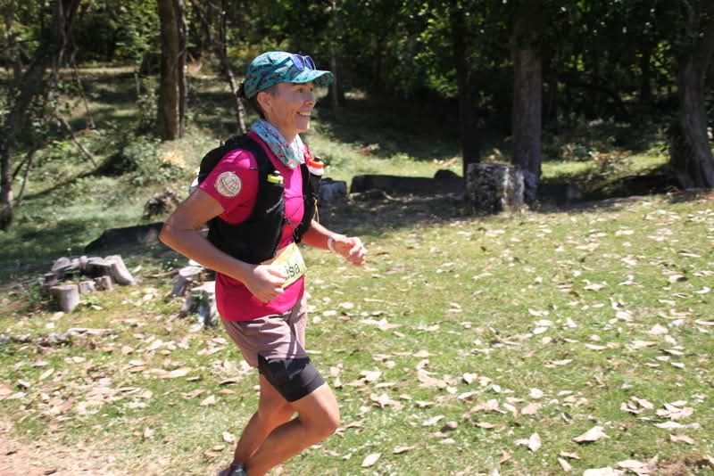 Lisa running on the trail during Global Limits Cambodia, December 2025